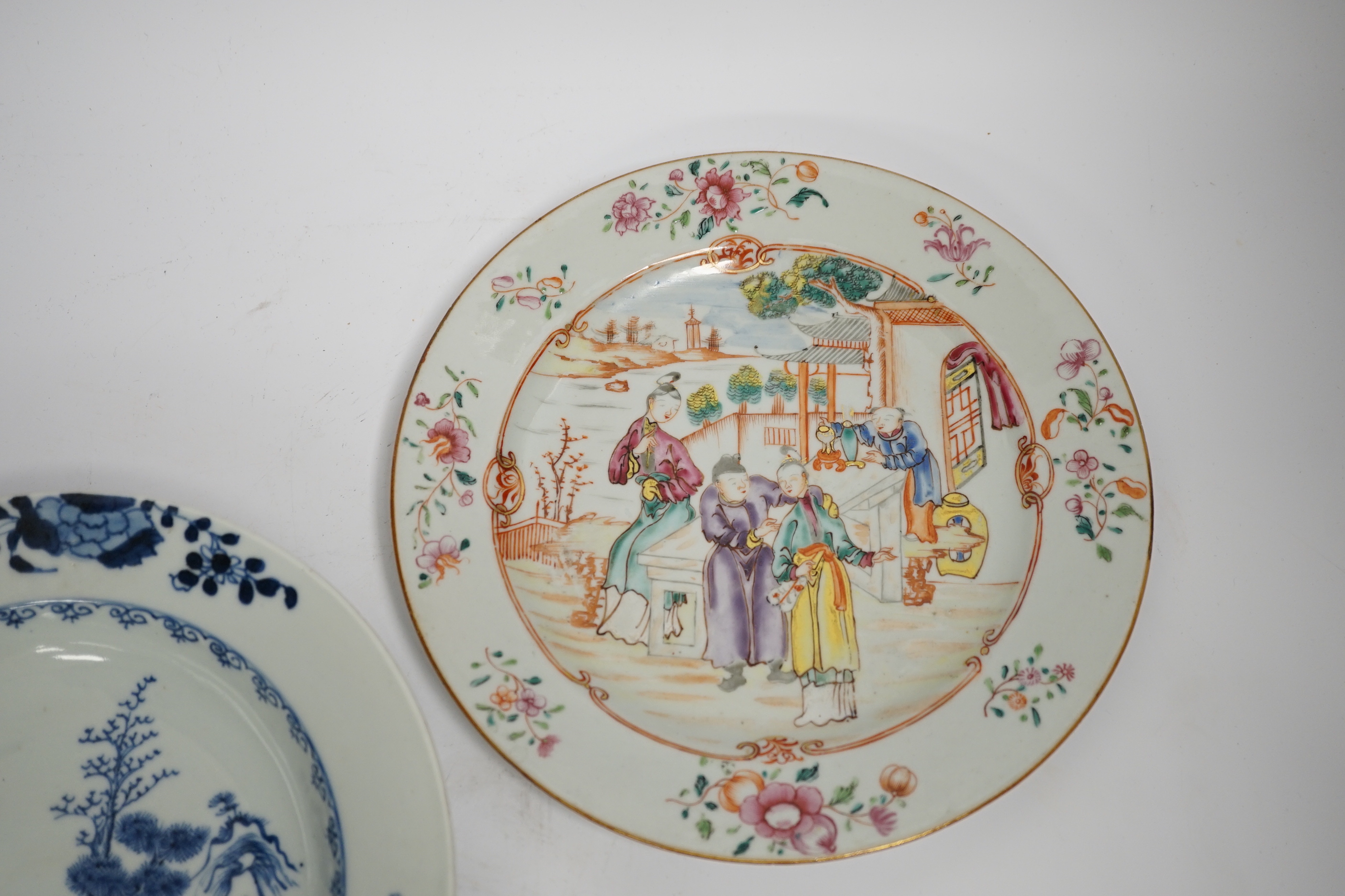 Two 18th century Chinese export plates and a 19th century Canton plate, largest 23cm